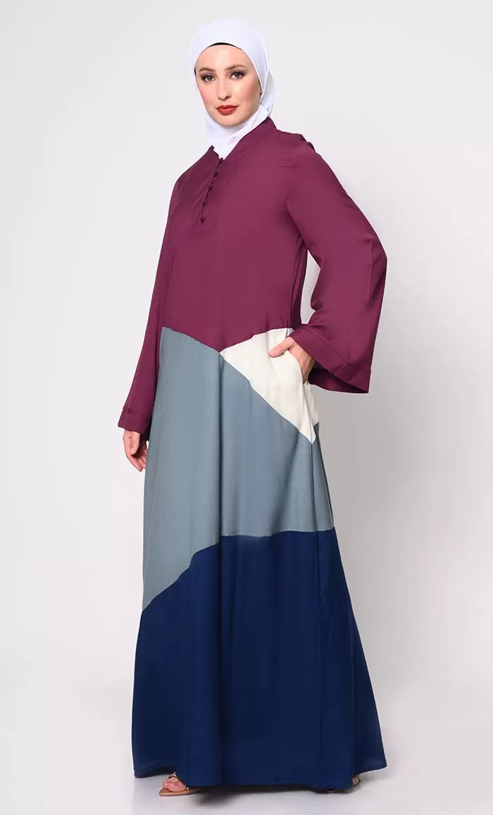 Contemporary Elegance: Abaya with Captivating Color-Blocking Panels and Practical Pockets