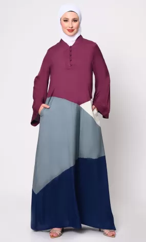 Contemporary Elegance: Abaya with Captivating Color-Blocking Panels and Practical Pockets