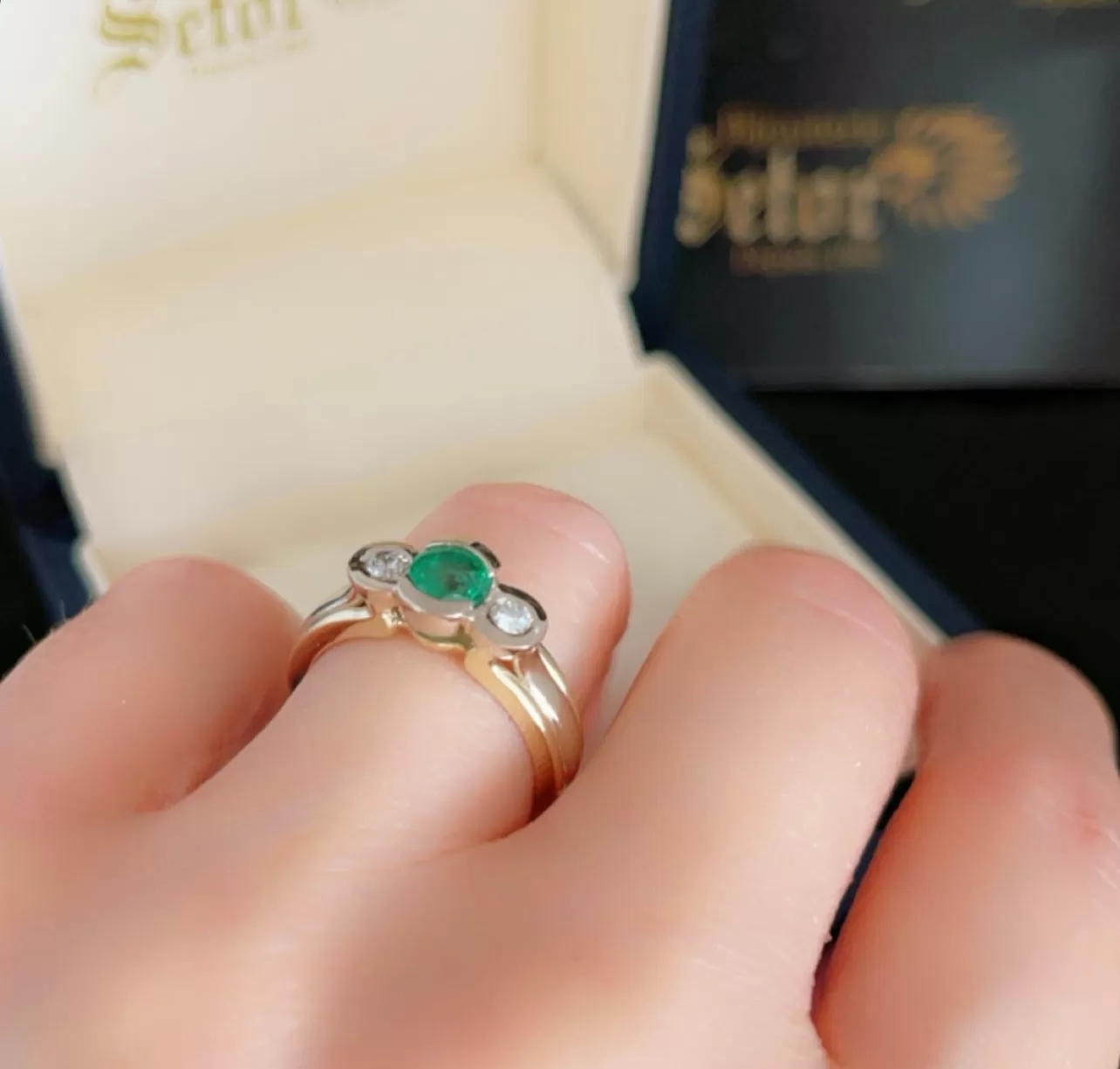 Emerald and diamond ring