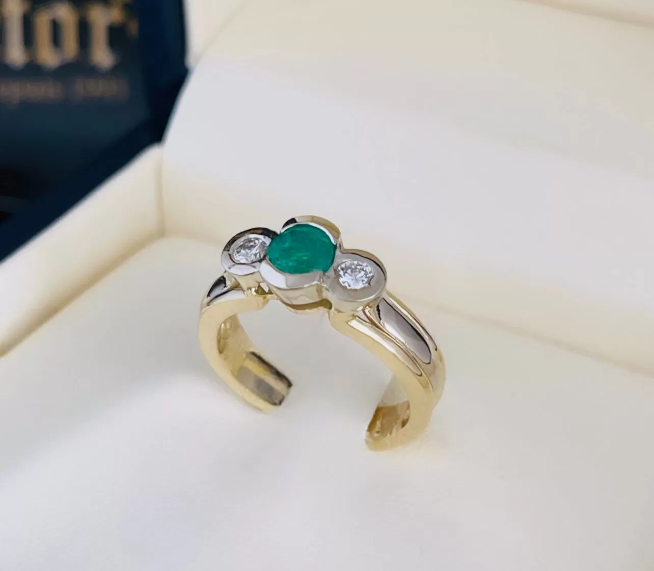 Emerald and diamond ring