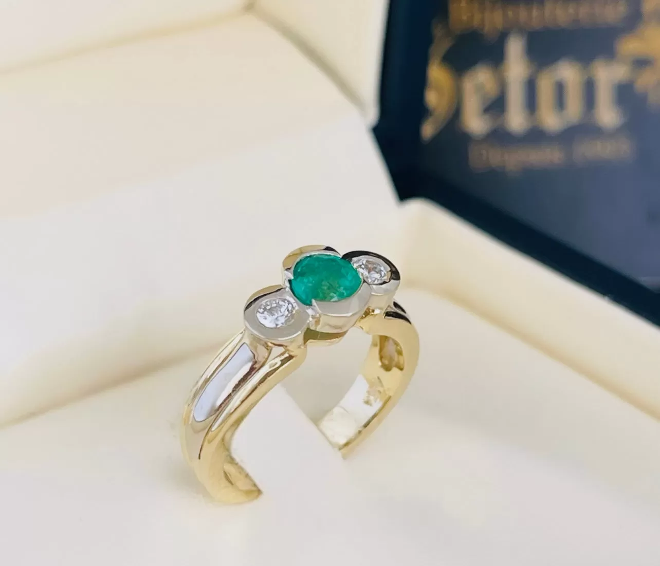 Emerald and diamond ring